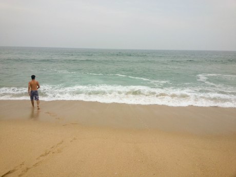 Moments before David was yelled at by several lifeguards for getting in the water without a flotation device.