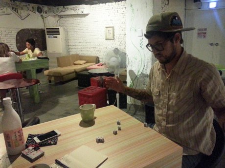 We got some game time in while drinking tangerine flavored makgeoli in the common room of our hostel because, well, it was still raining.