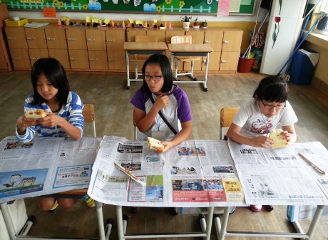 Flashback to summer camp when my students tried peanut butter and jelly sandwiches for the first time. They weren't quite sure what to think.