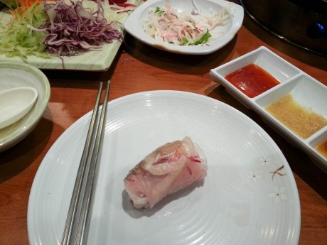 Then you wrap it up and dip it into one of the sauces. So good!